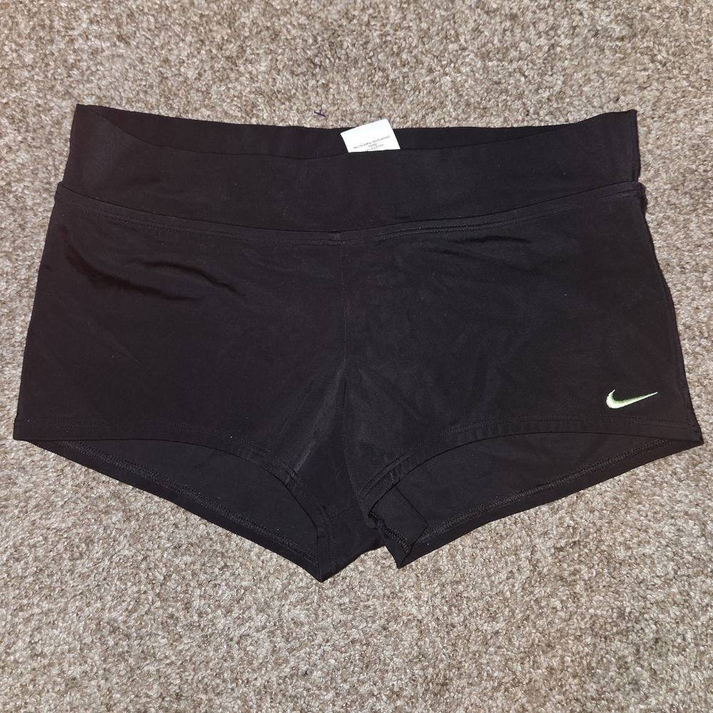 Nike Women's Black Athletic Shorts with Green Logo